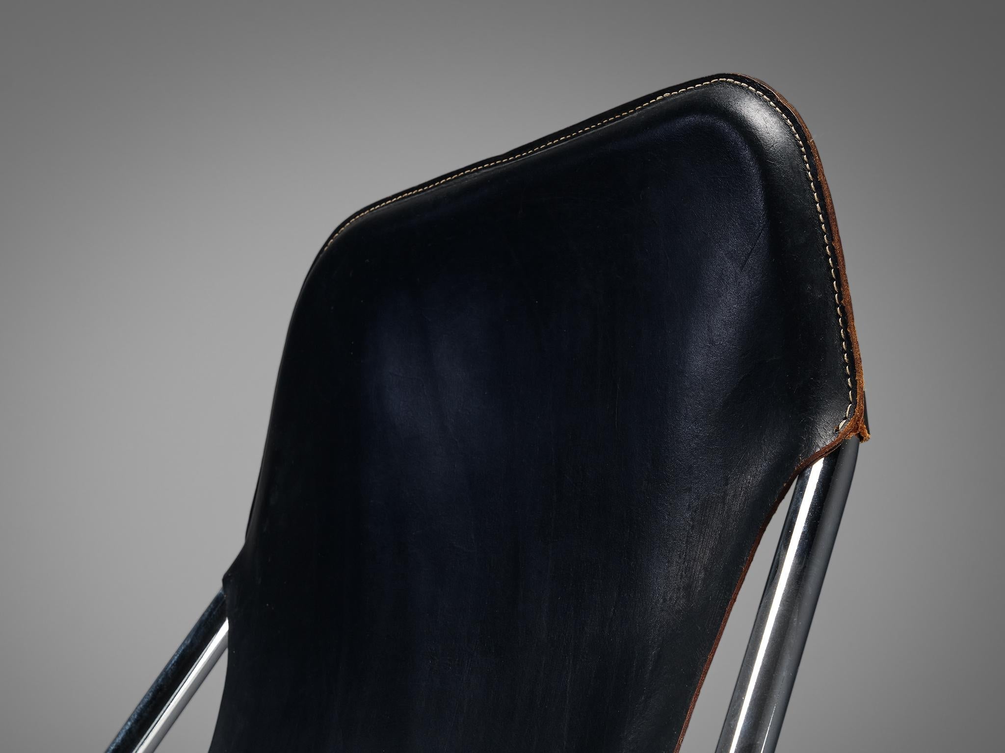 Tubular Lounge Chair and Ottoman in Black Leather