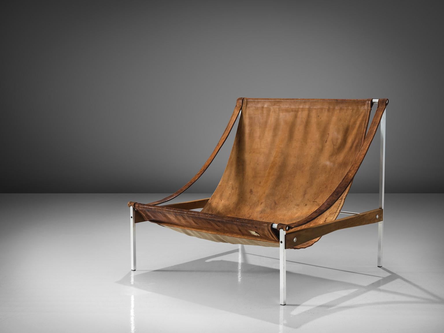 Rare Stig Poulsson 'Bequem' Lounge Chair in Brown Leather