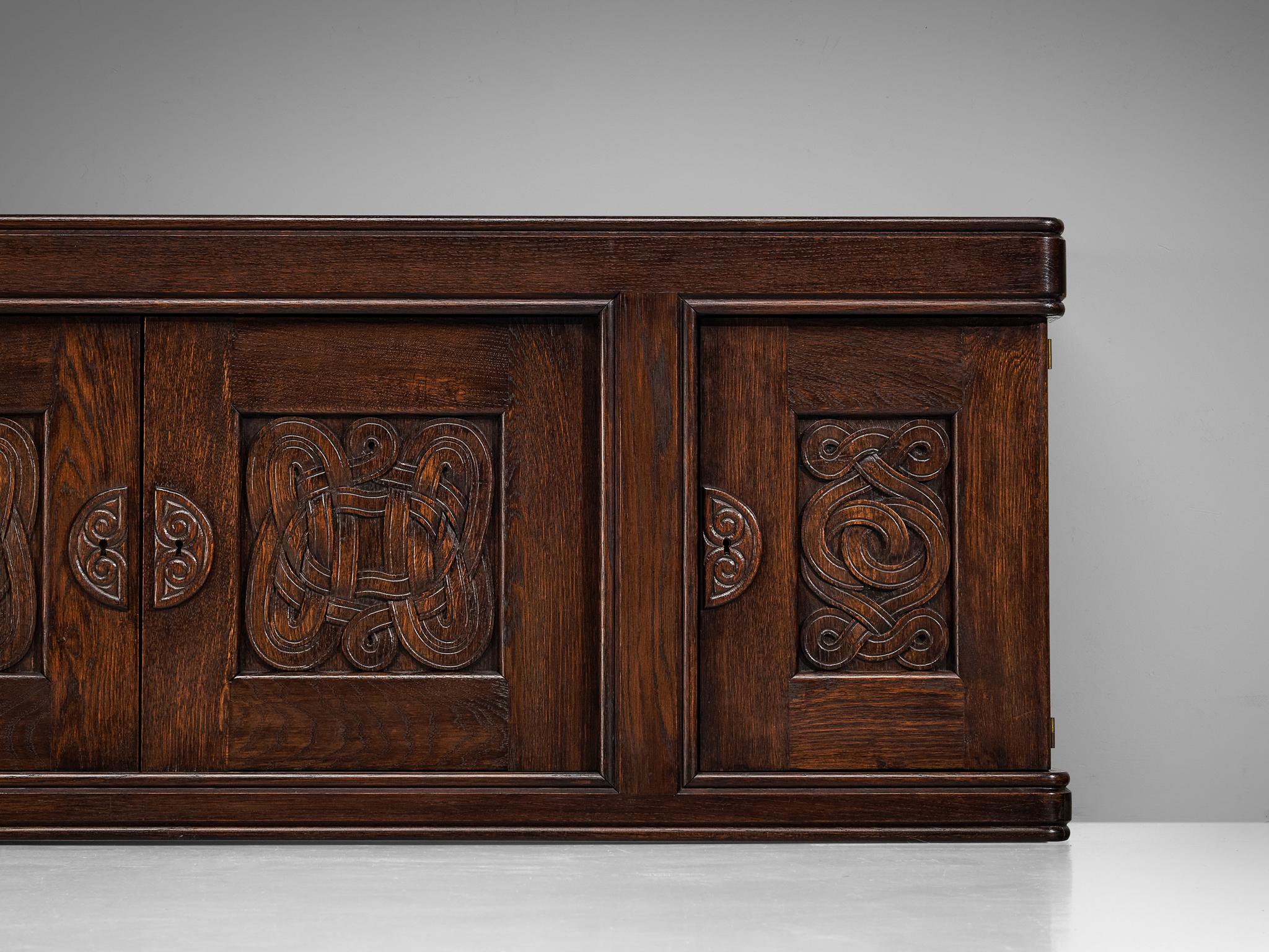 Joseph Savina Cabinet with Intricate Carvings in Oak