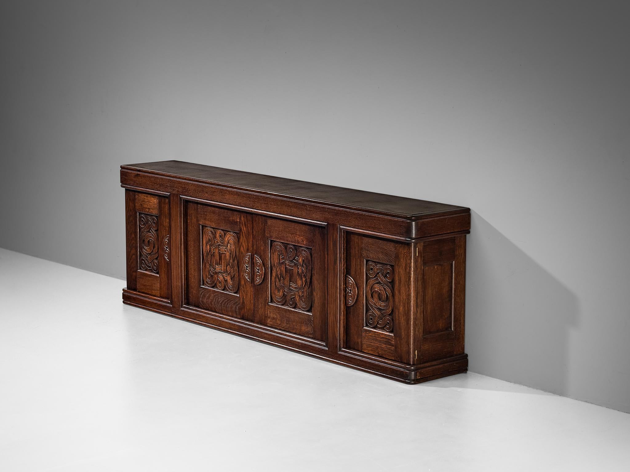 Joseph Savina Cabinet with Intricate Carvings in Oak