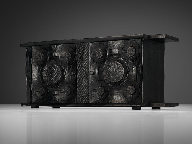 Sculptural Trunk in Black Lacquered Wood with Decorative Carvings
